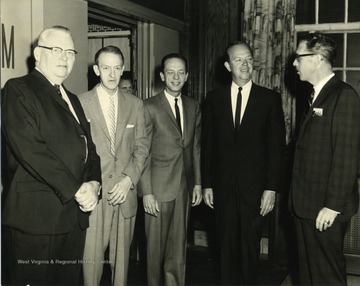 Don Knotts standing among other men.  Far right is Gerald Coy and far left is Clarence Johnson. 