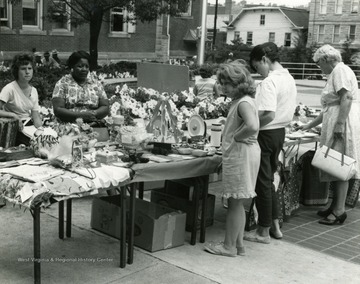 Shoppers browse the sale at the Courthouse in Morgantown, West Virginia. 