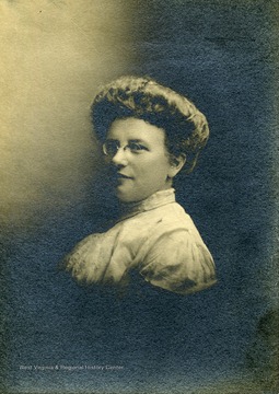 A portrait of Mrs. Alexander Thompson. First President of the Morgantown Music Club.