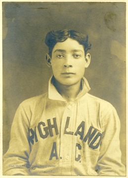 Young man is wearing a baseball uniform that says 'Highland A. C.'