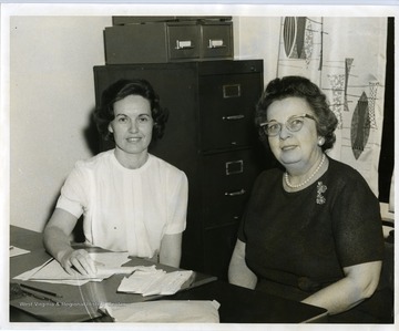 Mrs. George (Lena) Caruer, Girl Scout Office Secretary and Mrs. Harry Ziegler of Pittsburgh, Office Manager of Pittsburgh Girl Scouts. 