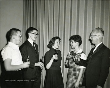 Second from left is 'Mike Toothman'. 