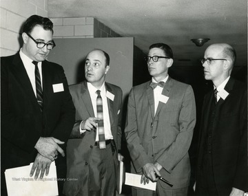 Left to right: Unknown, Unknown, 'Dr. Klingberg, Dr. Burroughs'. 