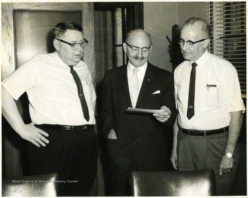 From left to right: James Ashburn, Milton Cohen, Elmer Prince.'