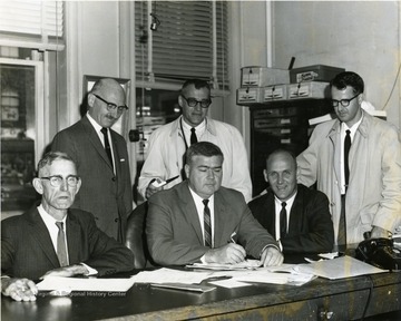 Some of the members include: seated left to right, J.D. Ward, Tom Jackson, Robert Nestor; standing left to right, Milton Cohen, Bill Leyhe, Unknown.