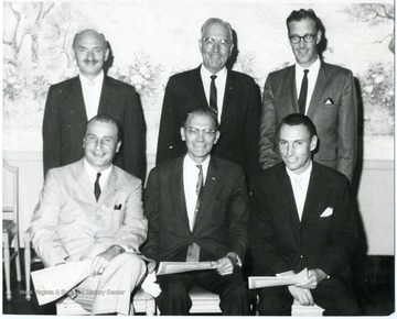 'Top row, left to right: Milton Cohen, Laurence Snyder and the Manager of Montgomery Wards.  Bottom Row from left to right: Howard Weiss, Martin Piribek and Lawrence DeLynn.'