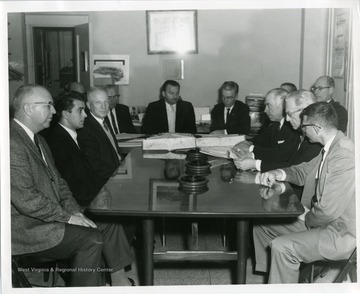 A City Council Meeting with Mayor Arthur Buehler and Howard Smyth.