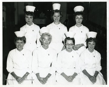 A portrait of seven new nurses, possibly at Monongalia General Hospital.