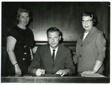 'From left to right: Mrs. Kenneth Madeira, Mayor Dan Blisset, Mrs. Margaret Brand.'