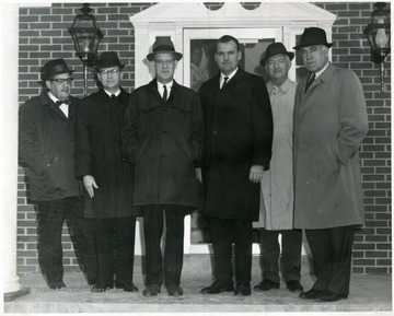 Third from left is Judge Don Eddy, at far right is Dyke Raese.