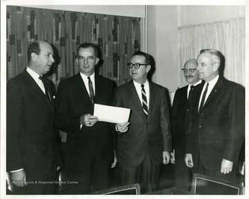 Milton Cohen is fourth from the right.