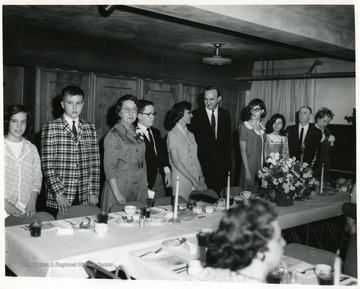 Mr. and Mrs. Henry Sheldon Arford (standing far right,) Sara Singleton (third from right,) Julius Singleton (fifth from right)and Mildred Schriver (third from left.) 