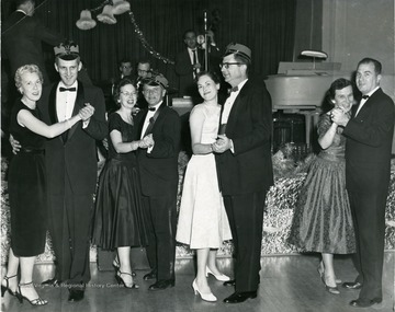 Among the couples dancing are: Ruth and Bill Moreland (second from right) and Roy and Ellen Harworth (second from left). 