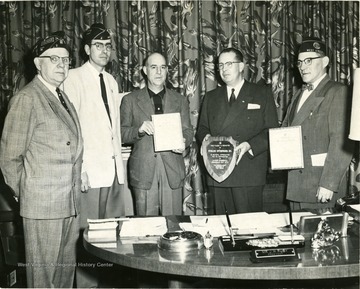 Left to right: R.E. Davis, Bill Miller, Unknown, J. W. Ruby, Unknown. 