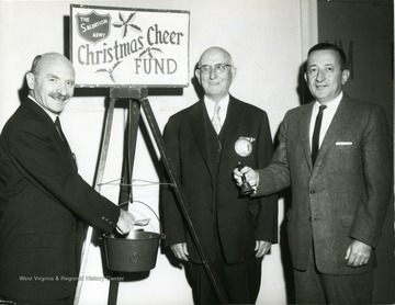 'Left to right: Milton Cohen, R. M. Davis, and Ward Stone'. 