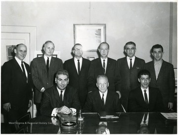 Robert Nestor(standing far left) and Howard Smith (seated third from left.) 