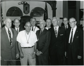 Jules Jacobs, third from left in back row, and Art Dye, third from left in front row. 