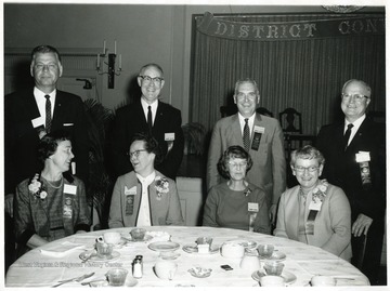 The center two ladies from left to right are: Mrs. Michel and Mrs. Lemke.  The two center men from left to right are: Louis E. Michel and Victor Lemke.