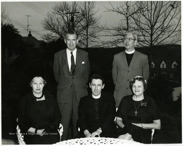 Rev. Chapman and his wife are the couple on the right.