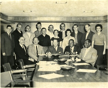 'Mr. Ruby seated center'. 