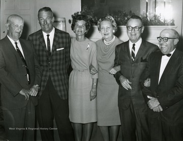 From left to right: 'Frank Corbin, Frank Corbin Jr., Mrs. Frank Corbin Jr., (daughter) Mrs. Bill Dyer, (son-in-law) Bill Dyer, Johnny Morris'. 