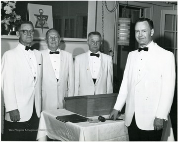 'Dental Society Officers-- Shown above are the officers of Omicron Kappa Upsilon, national dental honor society, at the University, which held its third annual banquet and convocation during graduation weekend. They are, from left to right: Dr. Roger V. Chastain, secretary-treasurer; Dr. Fred E. Bowers, vice-president; Dr. John D. Adams, president-elect; and Dr. Robert E. Sausen, president. All members of the School of Dentistry faculty.'