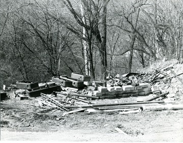 Refuse piled up at the gasoline company dump.