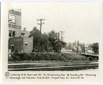 'Looking South West Garrett Street to University Avenue and Foundry Street-showing frontage of Hennen and Baltimore and Ohio Properties on Garrett Street.'
