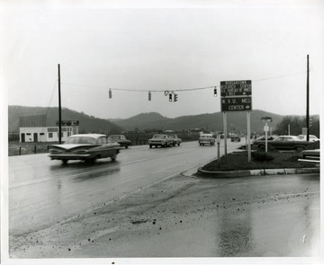 Cars are driving through the intersection of Monongahela Boulevard and Patteson Drive in Morgantown, West Virginia.