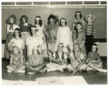 View of children dressed as pilgrims and indians in classroom in Morgantown, W. Va.  Front row, center, David Horton; Second row, second from left, Susan John; Third row, third from left, Stephanie McBee.