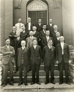 Group portrait of the Morgantown Methodist Ministers Association on the church steps.