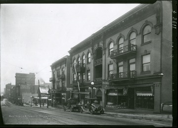 A view of High Street, corner of Willey Street, looking southwest, showing I. C. White buildings in Morgantown, West Virginia.