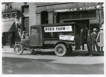 Bob's Farm Truck is parked in front of the Peoples Store on High Street in Morgantown, West Virginia.