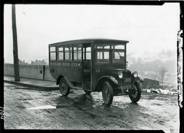 View of the Star Bus Company Bus at Corner of University Avenue and Garett Street Morgantown, W. Va.