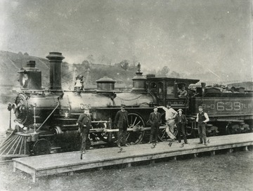 Baltimore and Ohio Locomotive number 639, Type 4-4-0 at Morgantown Depot with crew. Print number 1707.