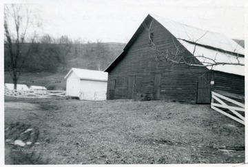 View of an 'Old Barn at the Farnsworth Farm between Linn and Troy. This barn is a log barn. It was used by the stage coach. it was a midway between Parkersburg and Beverly.'
