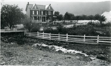 Fences line the lane to J. H. Smith's residence in Berkeley County.  Coped from an Agricultural Experiment Station glass plate negative number 1562.