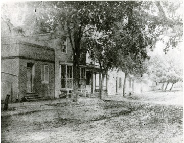 'A view of Moorefield post office and drug store. This scene is directly opposite what is now '1961' McCoy theater.'