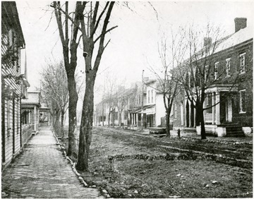 View of Main Street in Moorefield looking north from opposite McCoy Theater site. Building at right was then Turley Hotel.
