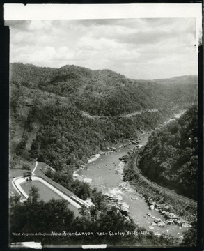 A view of the New River Canyon, near Gauley Bridge, in Fayette County, West Virginia. 'Showing surge basin on left and Chesapeake and Ohio Railroad on right. Outlet to three-mile length tunnel at Hawk's Nest. Kyle McCormick, The New - Kanawha River, page 94.'