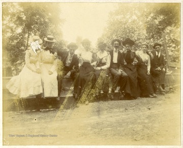 Vier of a group of men and women tourists posed at Blue Sulfur Springs in Greenbrier County, W. Va.