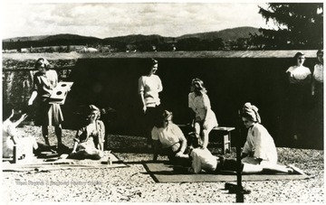 Girls of the same generation enjoying health-giving sun bath from the sun roof of Greenbrier Hall.