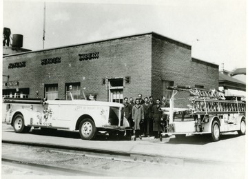 Motto 'Montani Semper Liberi' appears on the front of the station house. Fire truck on the left is a 1940 American LaFrance L-1185 model.