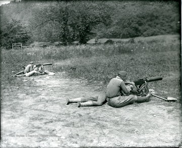 Men are participating in military training at Camp Greenbrier in Greenbrier County, West Virginia.