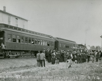 People gather to meet the Sunday train to greet the heroes of the Confederacy.