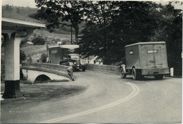 View of trucks crossing the McRoss Meadow River Bridge on U. S. Route 60 in Greenbrier County, W. Va.