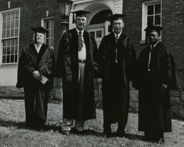 Group portrait with D. T. Moore on the left.
