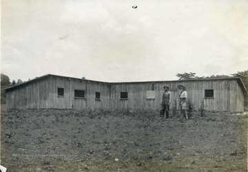 'This house is constructed like the letter T. The main part of the house is 14'6" x 8'. joining this at the middle of the south side is a roosting shed 12' x 40'.' From photo album labeled 'Stewart A. Cody, County Agent, Jackson County, 1912.'