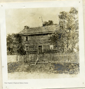 'Home of Jesse Hughes. Located at the mouth of Jesse's Run, Lewis County, West Virginia. This edifice is no longer standing.'Built in the late eighteenth century, this building also served as the Mitchell family homestead during the 1800s.