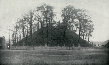 The 'Mammoth Mound' at Moundsville. 'One of the greatest pre-historic monuments in America. It is 245 feet in diameter at the base; 79 feet high, with apex flat, and about 150 feet in circumference.'